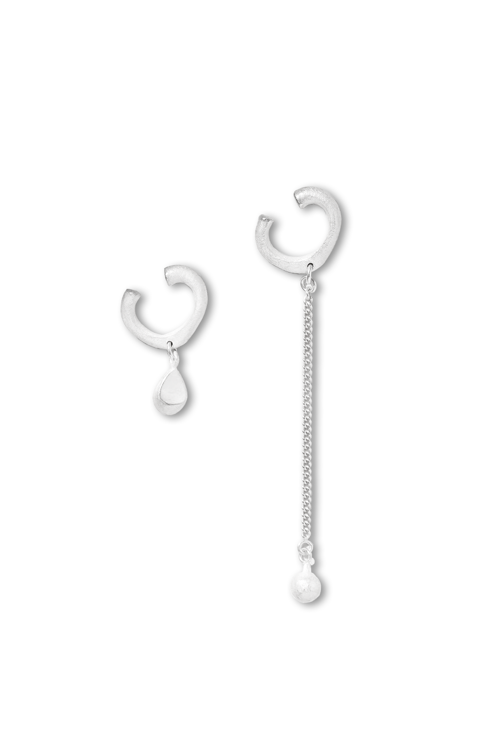 Dual textured silver ear cuffs: Drop pendant vs chain pendant - Minimalist contrast flatlay